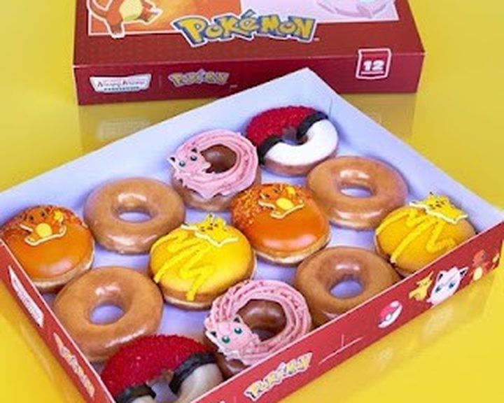 A colourful box of glazed doughnuts at Krispy Kreme Cardiff