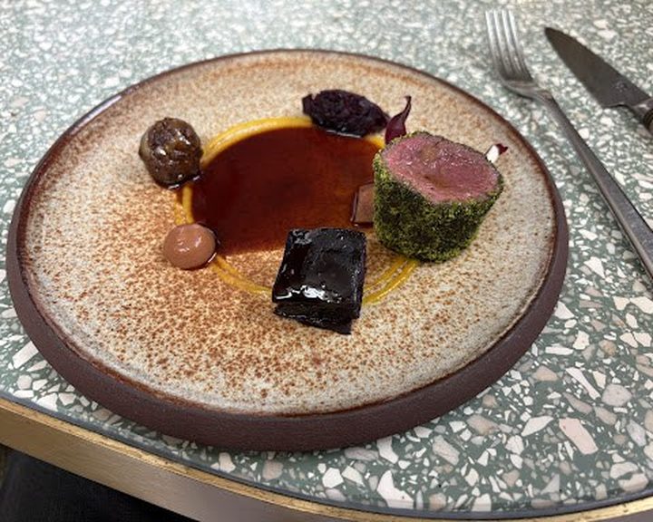 A creative meat course with beetroot and sauce at Muse Belgravia