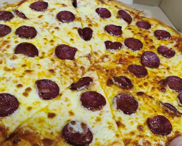 A freshly baked pizza at Pizza Palace in North Belfast
