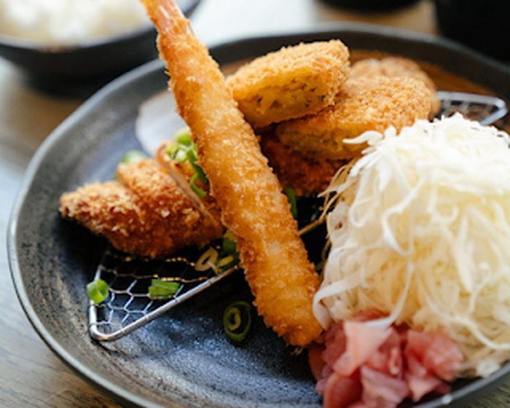Golden katsu with shredded cabbage and rice at Tanakatsu