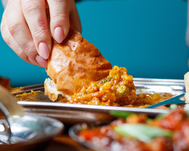 Indian street-food dish being shared at Tuk Tuk Southside in Edinburgh