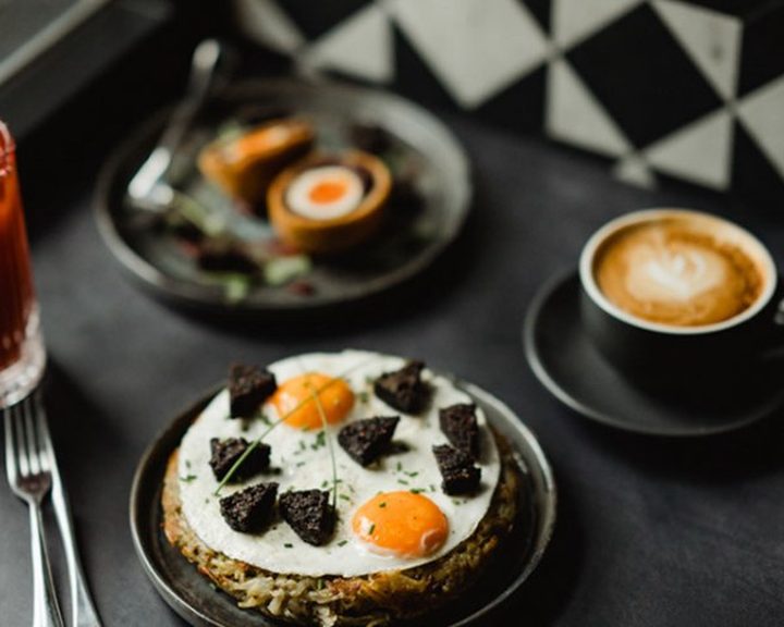 Breakfast plate with eggs and coffee at Brunswick Book Club