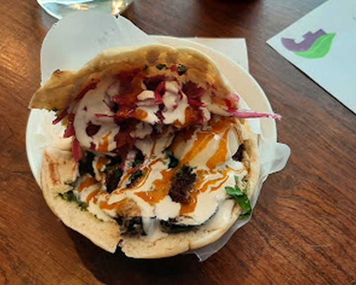 Falafel, salad and flatbread at Falafel Feast in Finchley
