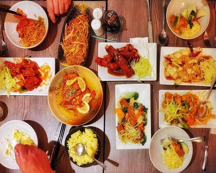 A spread of Cantonese dishes at Karen's Unicorn in Edinburgh