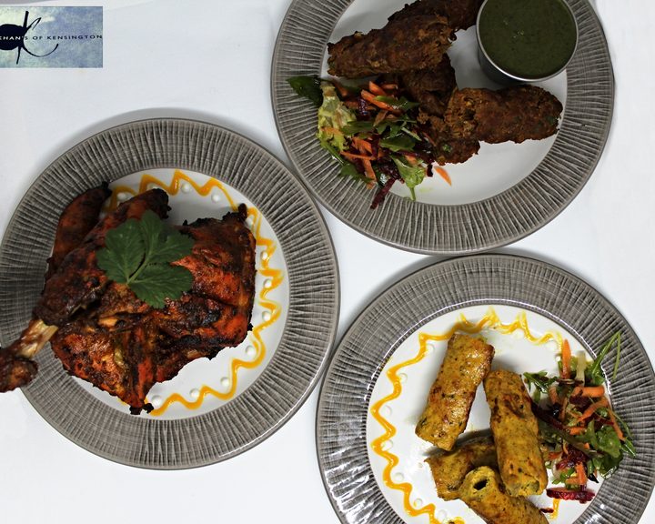 An Indian curry and tandoori sharing spread at Khan's of Kensington