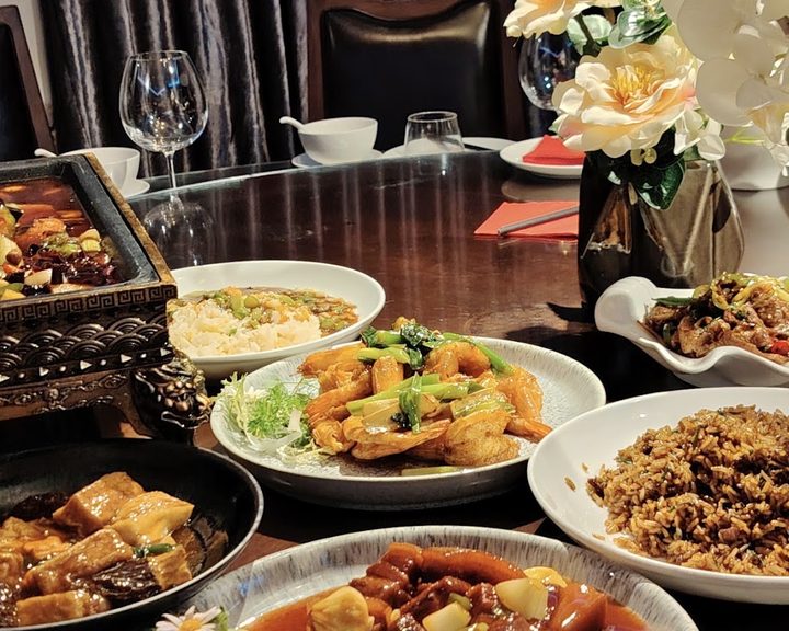 Chinese banquet dishes arranged for sharing at Kirin