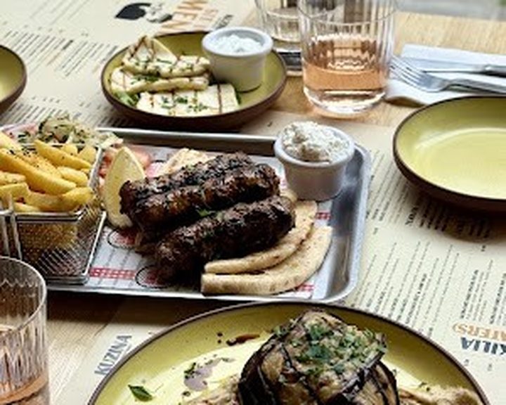 A Greek mixed grill with pita, salad and chips at Kuzina in Edinburgh