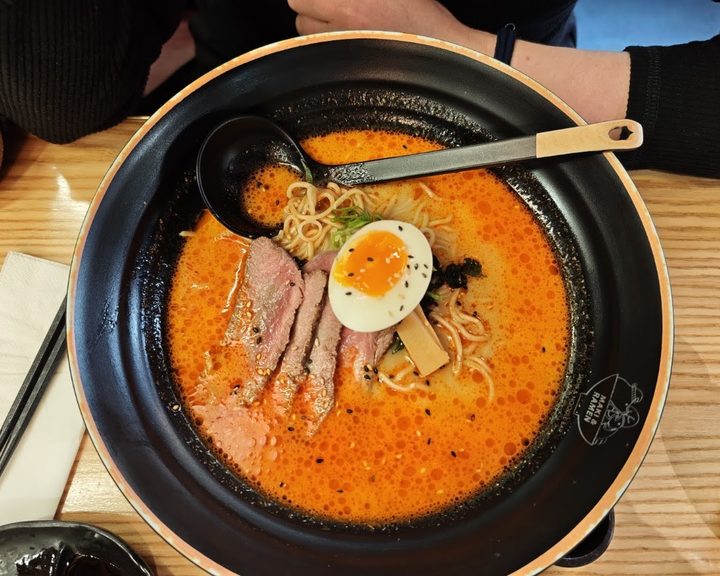 Spicy ramen with sliced meat and egg at Maki and Ramen Fountainbridge