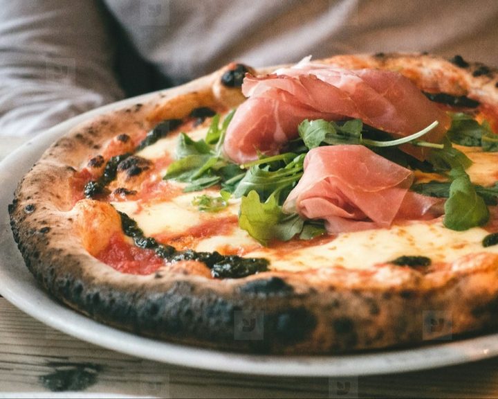 Neapolitan pizza with prosciutto and rocket at That’s Amore Edinburgh