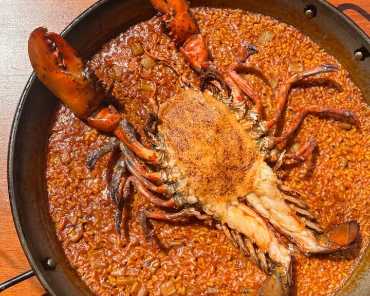 Valencian-style rice cooked over fire at Arros QD