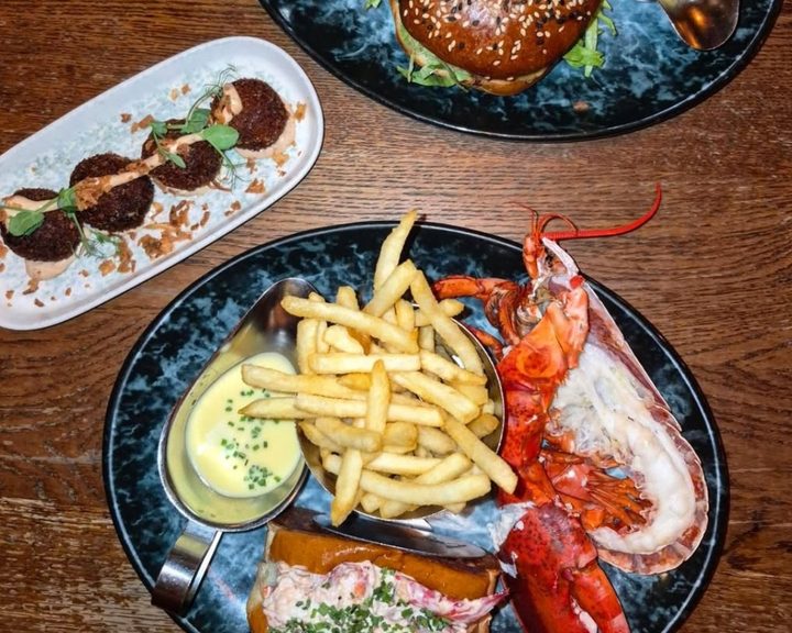 Lobster, fries and burger dishes from Burger & Lobster