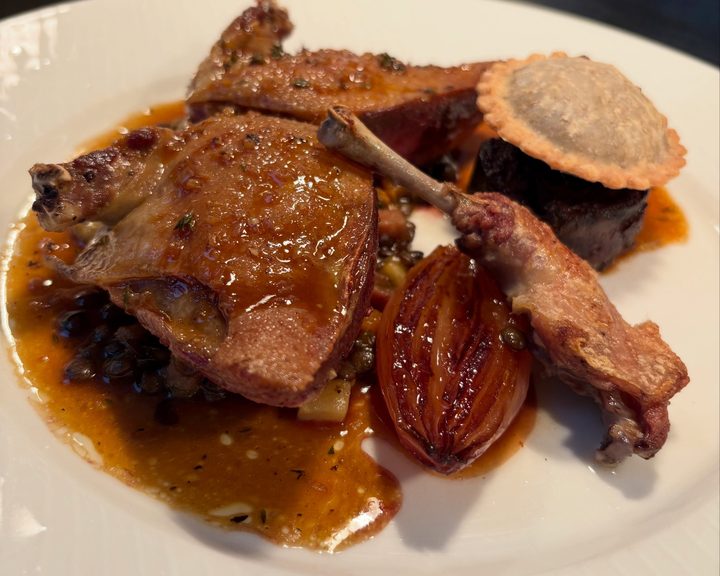 Pigeon with lentils, confit leg and shallot at Chez Bruce