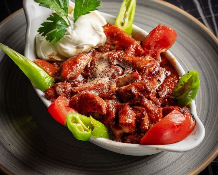 Grilled meat with tomato sauce and yoghurt at Diyarbakir Kitchen