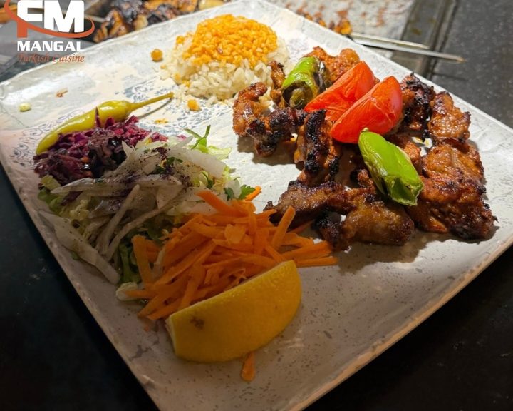 Chargrilled skewers with rice and salad at FM Mangal in Camberwell
