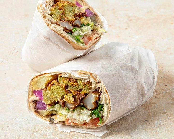 Deluxe falafel wrap with vegetables at Mr Falafel in Shepherd’s Bush