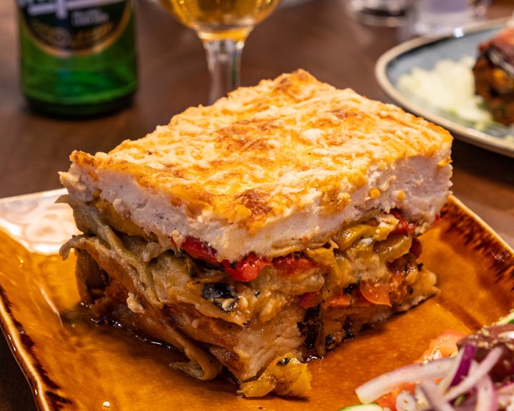 Golden-topped moussaka with aubergine and minced meat at Nostimo Bloomsbury