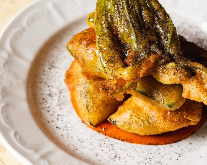 Courgette tempura with piquillo sauce and chestnut honey at Sabor