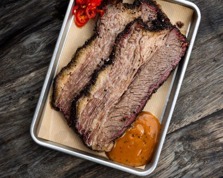 Sliced smoked beef brisket with pickled red chilli at Smokestak