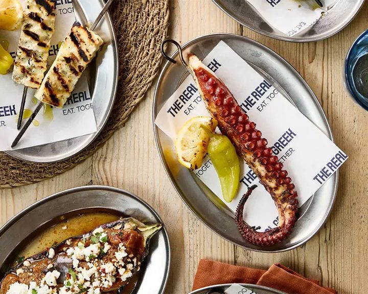Grilled octopus, halloumi skewers and aubergine from The Real Greek menu