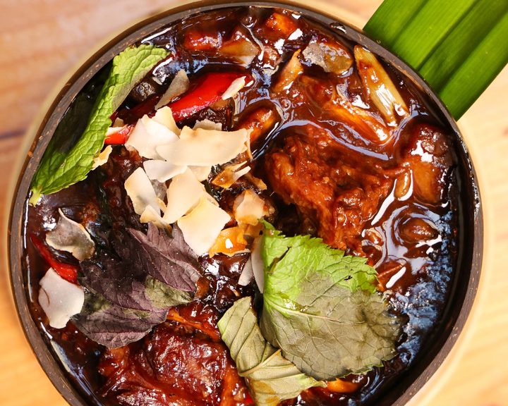 A Vietnamese hotpot with herbs and vegetables at Viet Food