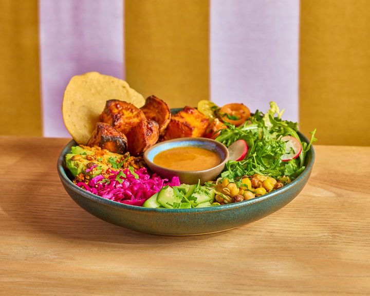 Sweet potato Sunshine Bowl with colourful vegetables at Wahaca