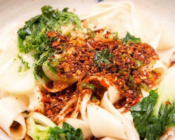 Hand-pulled noodles with chilli and herbs at Xian Impression